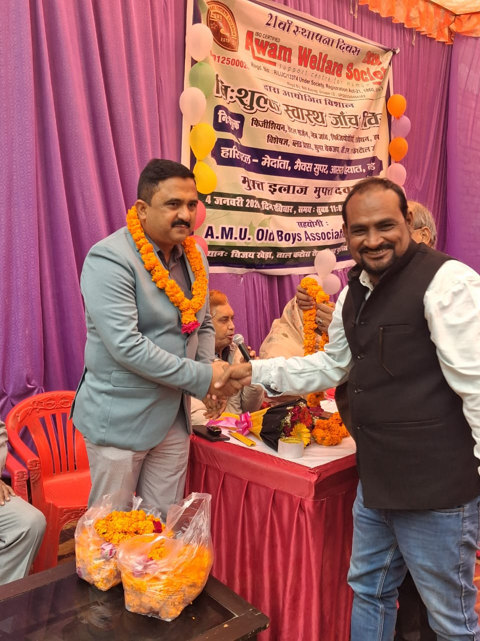Awam Welfare Society handshake ceremony